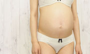 The lower part of the pregnant woman body. Manaka 8